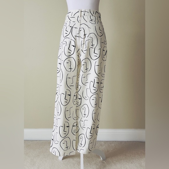 Shekou "Little Things" white denim jeans with a black abstract face print EUC - Picture 3 of 6